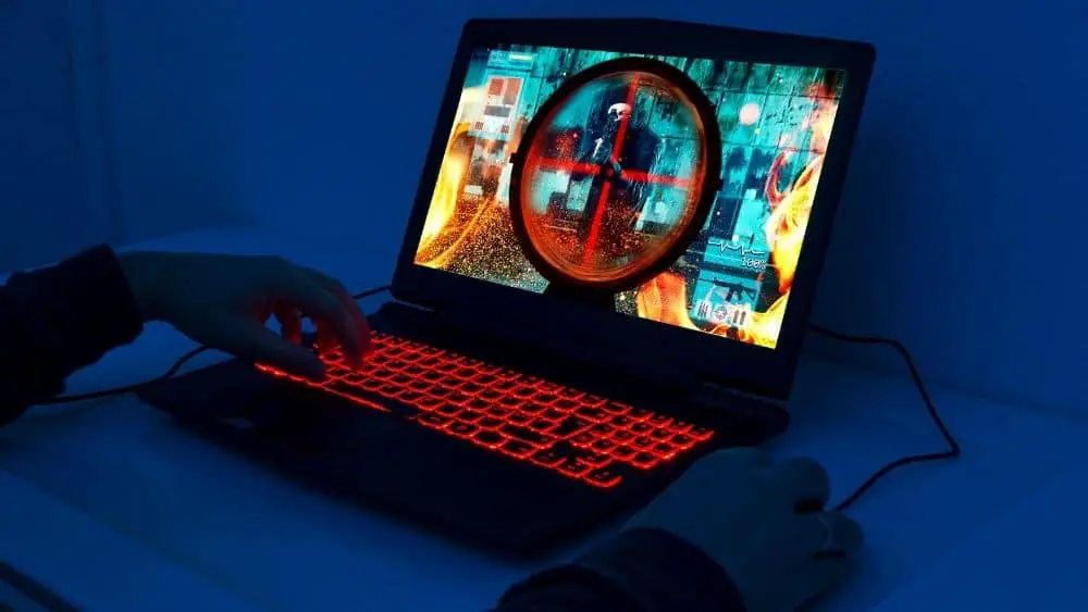 someone playing game on a laptop